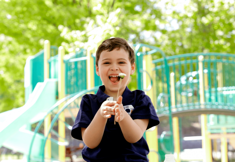 Child blowing bubbles