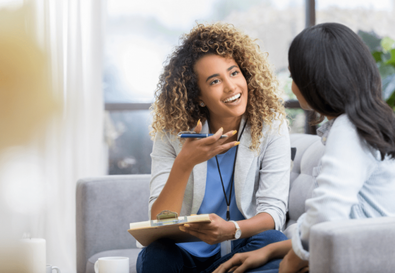 person sitting with a therapist
